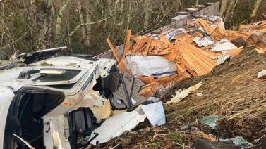 Tractor-trailer crash down embankment cuts power in Eatonville