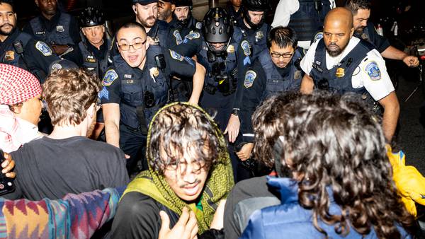 Police clear pro-Palestinian protest camp and arrest 33 at DC campus as mayor's hearing is canceled