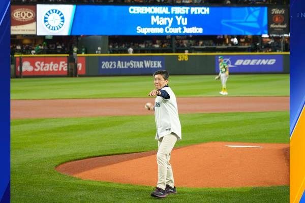 VIDEO: State Supreme Court justice throws out first pitch at Mariners game
