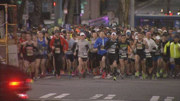 ‘Don’t forget to stretch!’: Thousands of runners fill city streets for Seattle Marathon