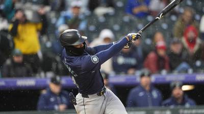 Castillo shuts down Rockies, Raleigh homers as Seattle beats Colorado 7-0 in 33-degree cold