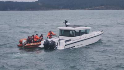 Ferry workers who rescue family off sinking boat receive Lifesaving Award