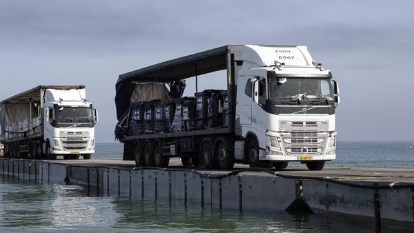 Aid from new pier off Gaza should be distributed this weekend, while pressure grows on Netanyahu