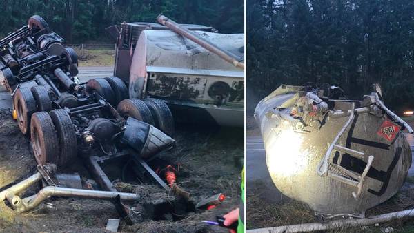 Double semi tanker truck carrying gasoline rolls over, spills fuel on I-5 in Lacey