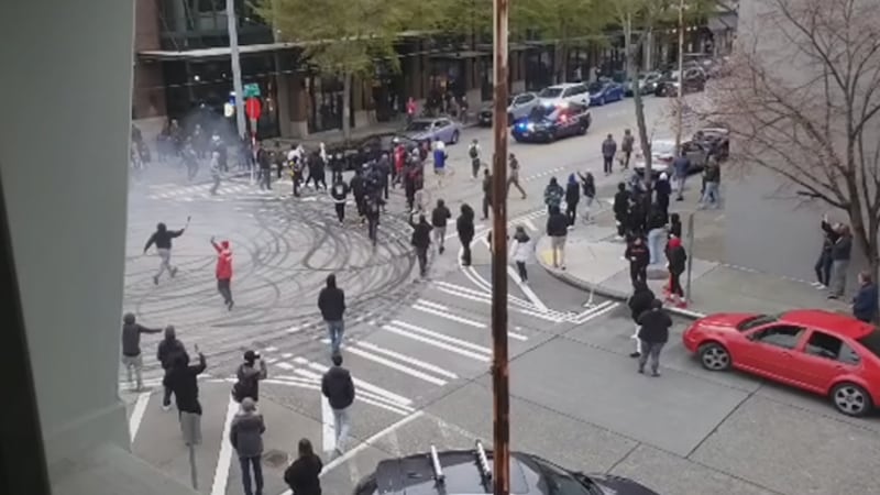 Tires squealed and smoke from burning rubber filled the air as cars did donuts outside the KIRO 7 studios on Saturday, April 15.