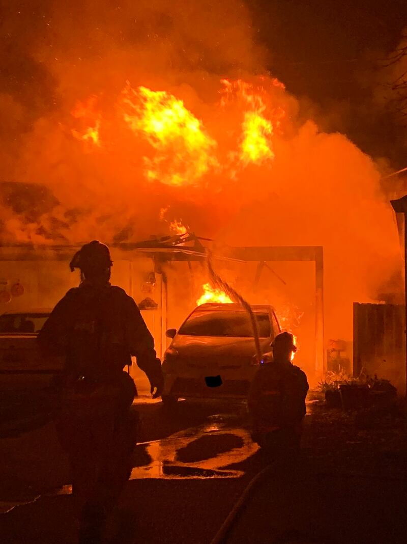 Firefighters put out a fire at this detached garage in the 3700 block of North Cheyenne Street at 3:08 a.m. on Jan. 26.