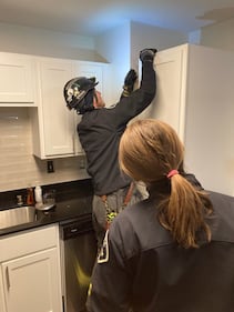 Bothell Kitten stuck behind cabinet