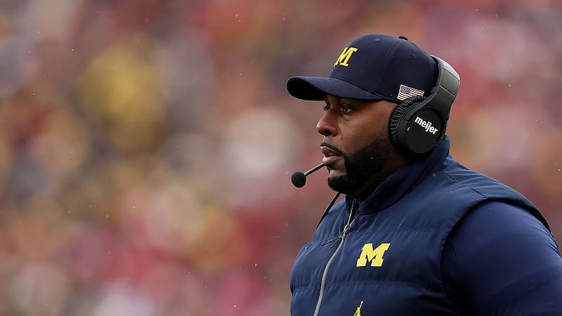 Fired Michigan football coach Sherrone Moore charged