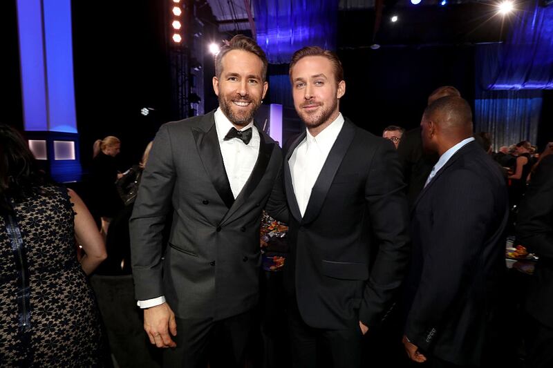 SANTA MONICA, CA - DECEMBER 11: Actors Ryan Reynolds (L) and Ryan Gosling attend The 22nd Annual Critics' Choice Awards at Barker Hangar on December 11, 2016 in Santa Monica, California.  (Photo by Christopher Polk/Getty Images for The Critics' Choice Awards )