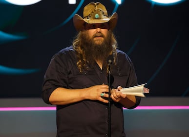 NASHVILLE, TENNESSEE - AUGUST 23: Chris Stapleton accepts the ACM Triple Crown Award onstage during the 16th Annual Academy of Country Music Honors  at Ryman Auditorium on August 23, 2023 in Nashville, Tennessee. (Photo by Jason Kempin/Getty Images for ACM)