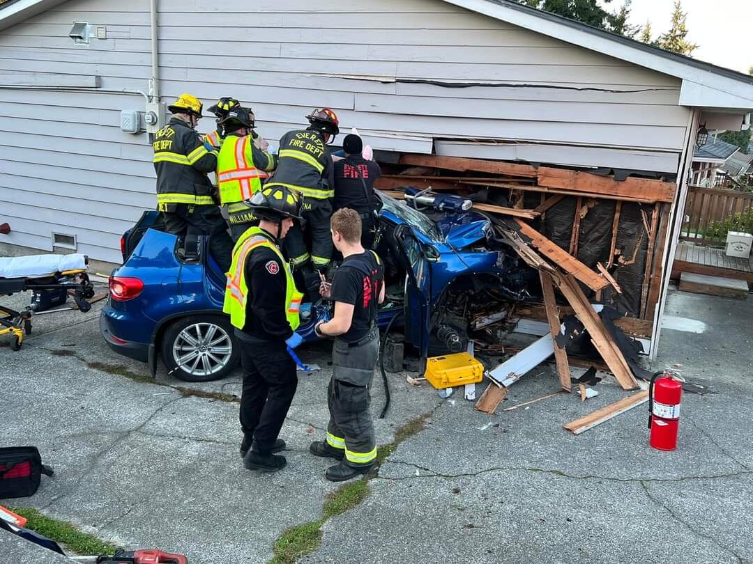 Everett car crashes into house
