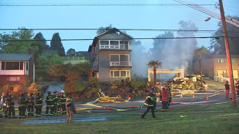 A 3-alarm fire caused a home under construction to collapse and damaged two others in Seattle's Mount Baker neighborhood.