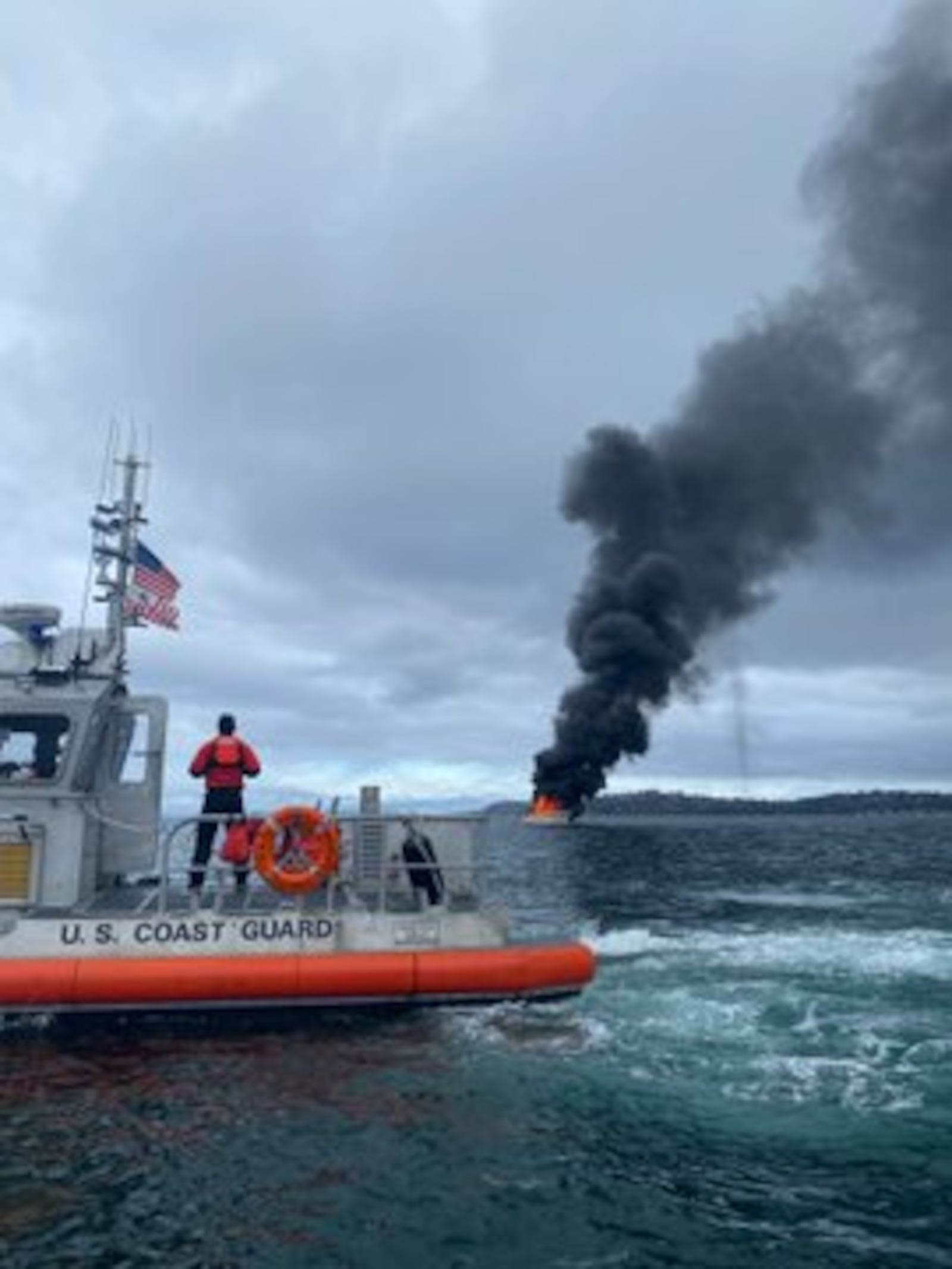 A boat goes up in flames in Elliott Bay, one person rescued – KIRO 7 ...