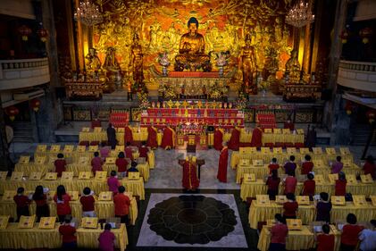 MANILA, PHILIPPINES - FEBRUARY 10: Filipinos offer prayers at the Seng Guan temple during Lunar New Year celebrations at Binondo district, considered the world's oldest Chinatown, on February 10, 2024 in Manila, Philippines. Lunar New Year, also known as Chinese New Year, is celebrated around the world, and the year of the Wood Dragon in 2024 is associated with growth, progress, and abundance, as wood represents vitality and creativity, while the dragon symbolizes success, intelligence, and honor. (Photo by Ezra Acayan/Getty Images)