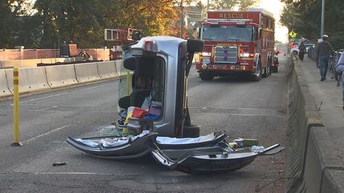 A driver had to be cut out of her car after a rollover crash on the Admiral Way SW Bridge in West Seattle on 10/1/24