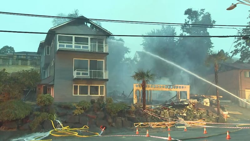 A 3-alarm fire caused a home under construction to collapse and damaged two others in Seattle's Mount Baker neighborhood.