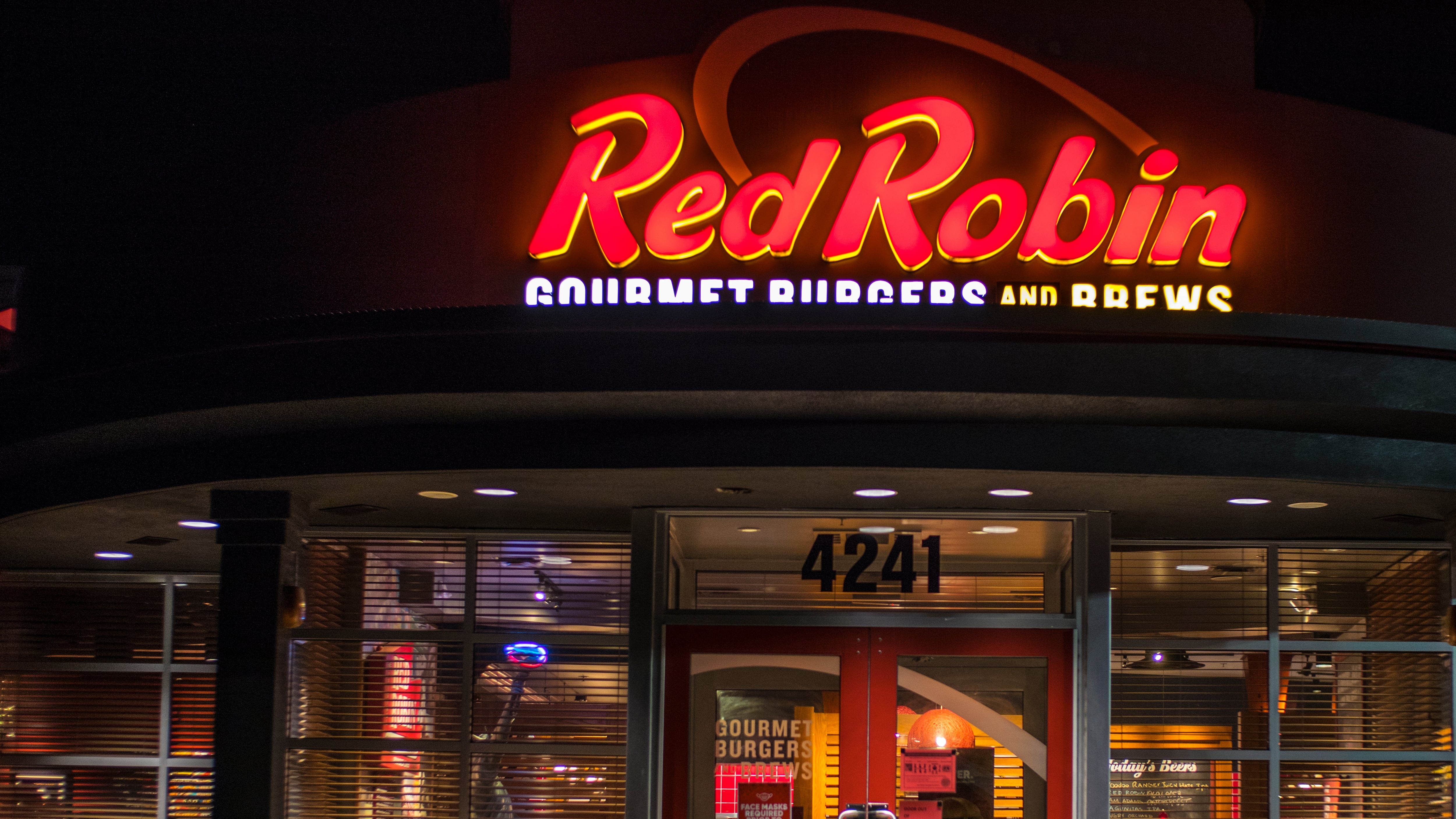 Red Robin fast food restaurant location at night entrance and sign