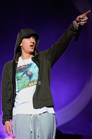 CHICAGO, IL - AUGUST 01: Eminem performs at Samsung Galaxy stage during 2014 Lollapalooza Day One at Grant Park on August 1, 2014 in Chicago, Illinois. (Photo by Theo Wargo/Getty Images)
