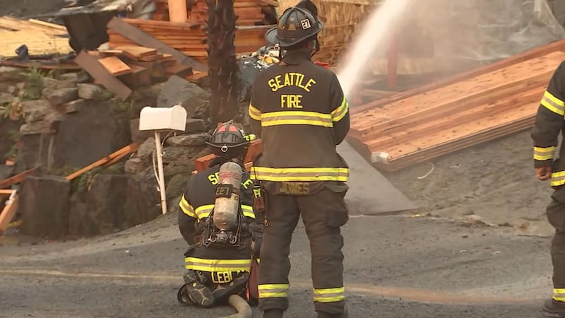 A 3-alarm fire caused a home under construction to collapse and damaged two others in Seattle's Mount Baker neighborhood.