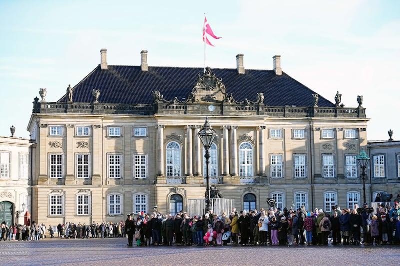 COPENHAGEN, DENMARK - JANUARY 14: Members of the public arrive ahead of the proclamation of HM King Frederik X and HM Queen Mary of Denmark at Amalienborg Palace Square on January 14, 2024 in Copenhagen, Denmark. Her Majesty Queen Margrethe II steps down as Queen of Denmark and entrusts the Danish throne to His Royal Highness The Crown Prince, who becomes His Majesty King Frederik X and Head of State of Denmark. (Photo by Martin Sylvest Andersen/Getty Images)