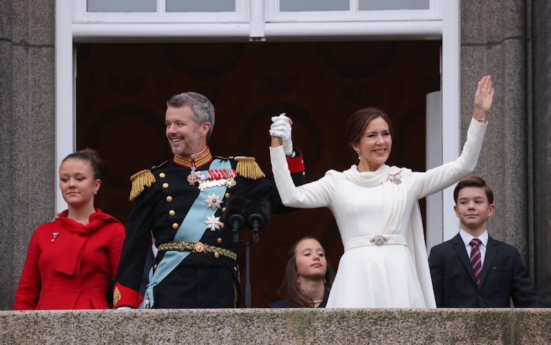 COPENHAGEN, DENMARK - JANUARY 14: (L-R) Princess Isabella of Denmark, King Frederik X of Denmark, Princess Josephine of Denmark, Queen Mary of Denmark and Prince Vincent of Denmark wave to the crowd after a declaration of the King's accession to the throne, from the balcony of Christiansborg Palace on January 14, 2024 in Copenhagen, Denmark. King Frederik X is succeeding Queen Margrethe II, who will be stepping down after reigning for 51 years. (Photo by Sean Gallup/Getty Images)