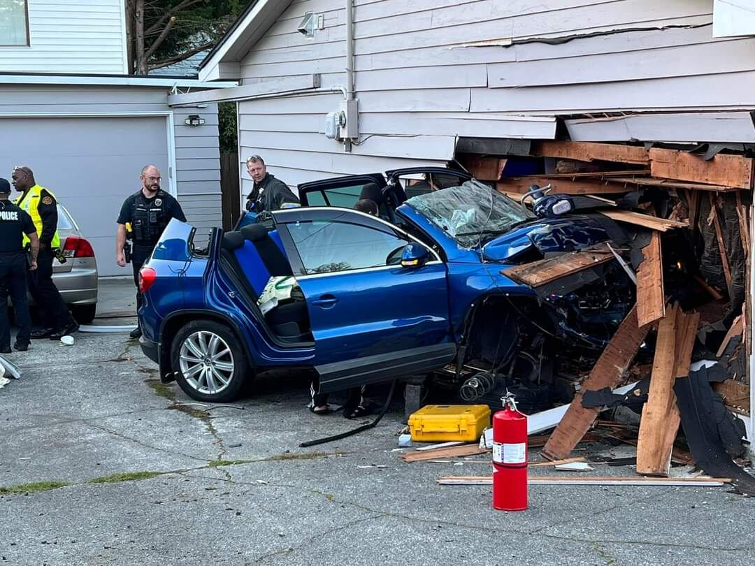 Everett car crashes into house
