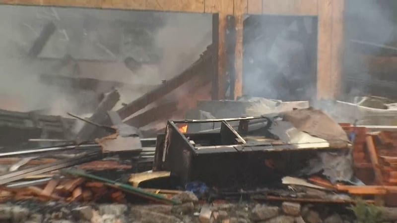 A 3-alarm fire caused a home under construction to collapse and damaged two others in Seattle's Mount Baker neighborhood.