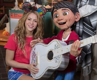 ANAHEIM, CA. SEPTEMBER 09: In this handout photo provided by Disney Parks, Global superstar Shakira meets Miguel of Disney-Pixars Coco while on break from her world tour at Disney California Adventure September 9, 2018 in Anaheim, California. Miguel serenades Disney California Adventure guests daily at Plaza de la Familia during Musical Celebration of Coco. (Photo by Joshua Sudock/Disney Parks via Getty Images)