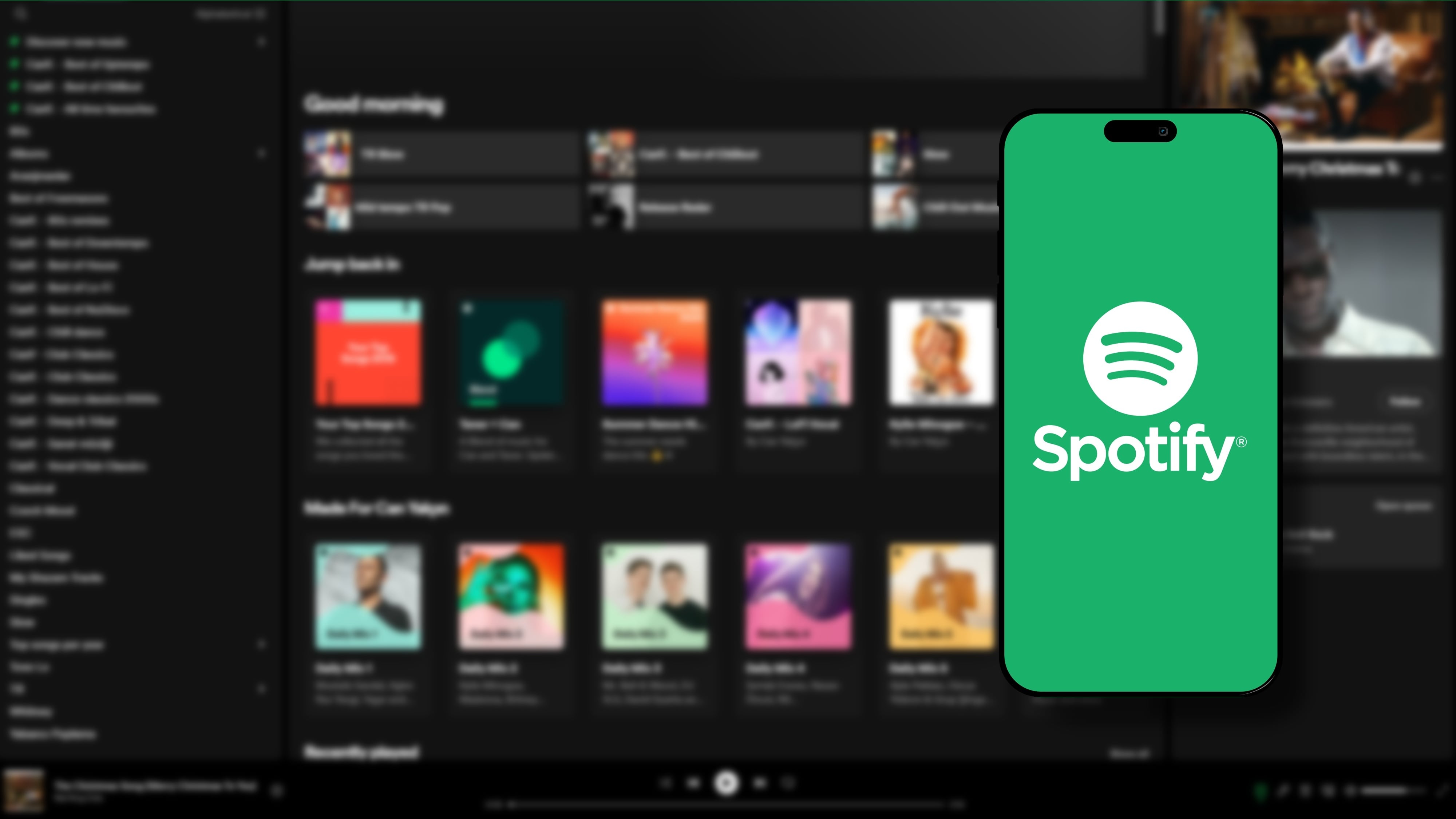 Spotify brand logo on smartphone screen with Spotify website in the background.