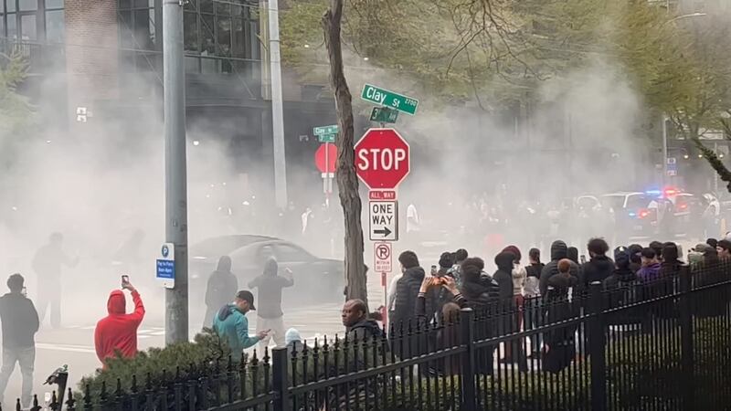 Tires squealed and smoke from burning rubber filled the air as cars did donuts outside the KIRO 7 studios on Saturday, April 15.