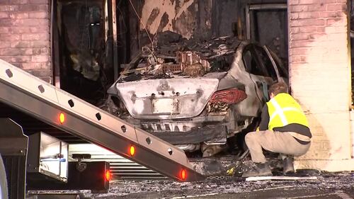 A Federal Way Jack in the Box is in shambles after a car slammed into the side of the restaurant and burst into flames.