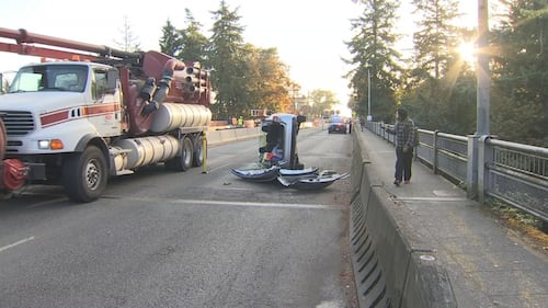 A driver had to be cut out of her car after a rollover crash on the Admiral Way SW Bridge in West Seattle on 10/1/24