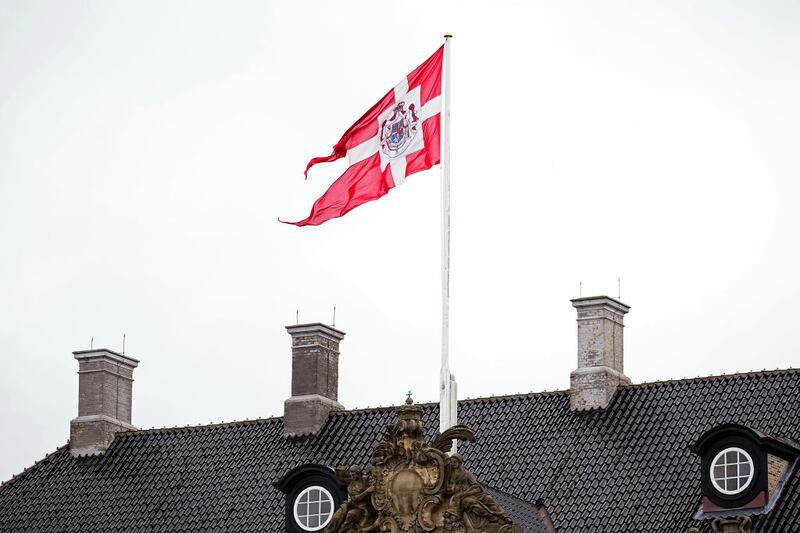 COPENHAGEN, DENMARK - JANUARY 14: The Royal Standard of Denmark is on display ahead of the proclamation of HM King Frederik X and HM Queen Mary of Denmark at Amalienborg Palace Square on January 14, 2024 in Copenhagen, Denmark. Her Majesty Queen Margrethe II steps down as Queen of Denmark and and entrusts the Danish throne to His Royal Highness The Crown Prince, who becomes His Majesty King Frederik X and Head of State of Denmark. (Photo by Martin Sylvest Andersen/Getty Images)