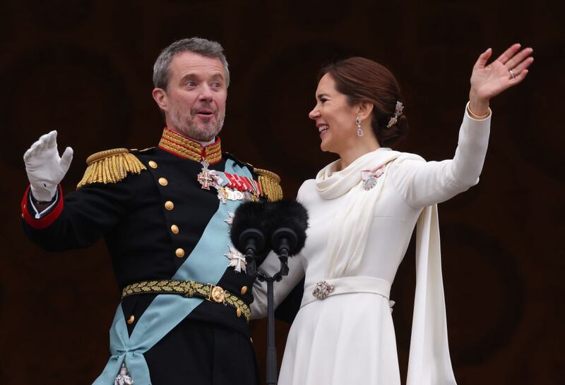 COPENHAGEN, DENMARK - JANUARY 14: Danish King Frederik X and wife Queen Mary of Denmark after his proclamation by the Prime Minister, Mette Frederiksen on the balcony of Christiansborg Palace on January 14, 2024 in Copenhagen, Denmark. King Frederik X is succeeding Queen Margrethe II, who will be stepping down after reigning for 51 years. (Photo by Sean Gallup/Getty Images)