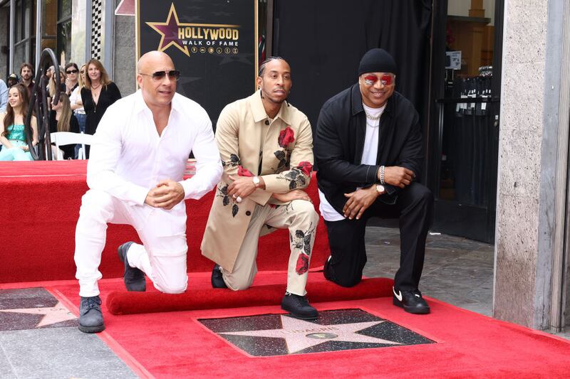 HOLLYWOOD, CALIFORNIA - MAY 18: Vin Diesel, Ludacris, and LL Cool J attend a ceremony honoring Ludacris with a star on the Hollywood Walk of Fame on May 18, 2023 in Hollywood, California. (Photo by Tommaso Boddi/Getty Images)