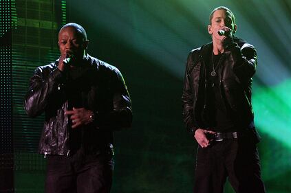 LOS ANGELES, CA - FEBRUARY 13: Rappers Dr. Dre (L) and Eminem perform onstage during The 53rd Annual GRAMMY Awards held at Staples Center on February 13, 2011 in Los Angeles, California. (Photo by Kevin Winter/Getty Images)