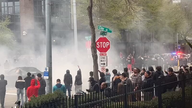 Tires squealed and smoke from burning rubber filled the air as cars did donuts outside the KIRO 7 studios on Saturday, April 15.