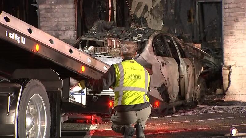 A Federal Way Jack in the Box is in shambles after a car slammed into the side of the restaurant and burst into flames.