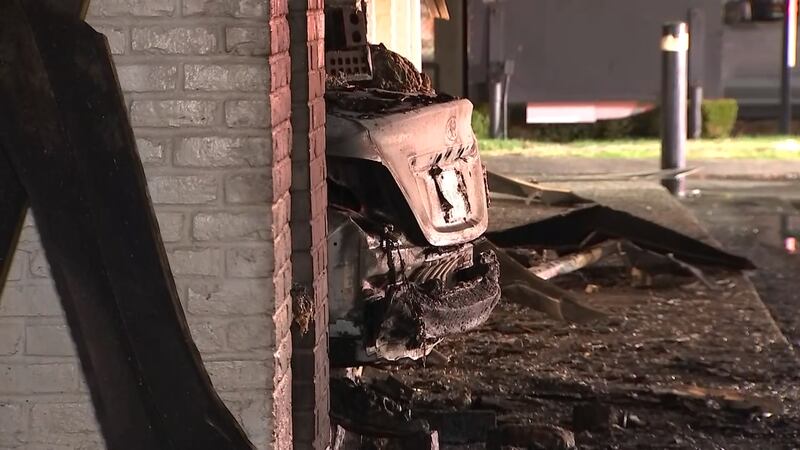 A Federal Way Jack in the Box is in shambles after a car slammed into the side of the restaurant and burst into flames.