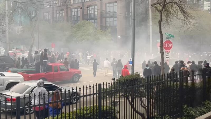 Tires squealed and smoke from burning rubber filled the air as cars did donuts outside the KIRO 7 studios on Saturday, April 15.