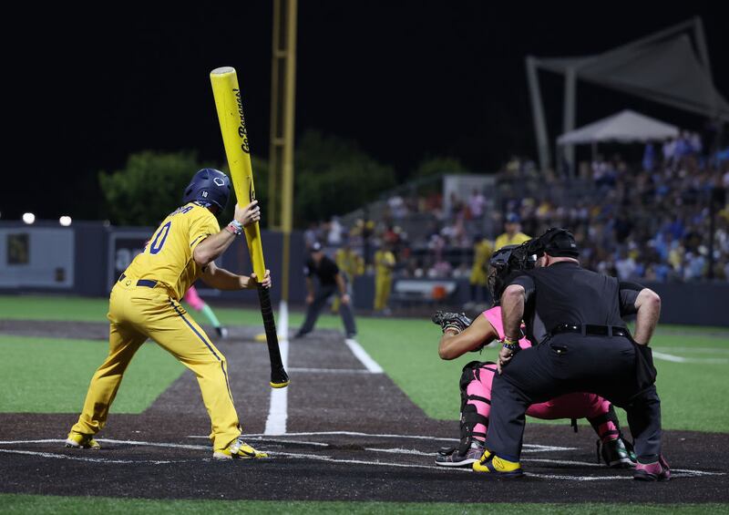 NEW YORK, NEW YORK - AUGUST 12:  Alex Zeigler #10 of the Savannah Bananas comes to the plate with an oversized bat during their game against the Party Animals at Richmond County Bank Ball Park on August 12, 2023 in New York City.  The Savannah Bananas were part of the Coastal Plain League, a summer collegiate league, for seven seasons. In 2022, the Bananas announced that they were leaving the Coastal Plain League to play Banana Ball year-round. Banana Ball was born out of the idea of making baseball more fast-paced, entertaining, and fun.   (Photo by Al Bello/Getty Images)