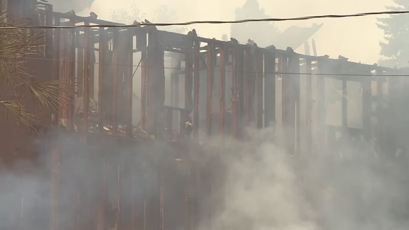 A 3-alarm fire caused a home under construction to collapse and damaged two others in Seattle's Mount Baker neighborhood.