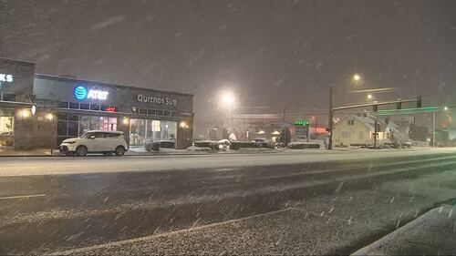 Snow fell in a narrow band just south of downtown Everett.