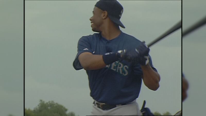 Ken Griffey Jr. taking his swings.