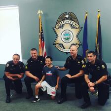 <p>A group of police officers reunited with the boy they found locked in an attic six years ago.</p>