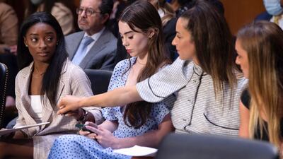 United States gymnasts from left, Simone Biles, McKayla Maroney, Aly Raisman and Maggie Nichols, arrive to testify during a Senate Judiciary hearing about the Inspector General's report on the FBI's handling of the Larry Nassar investigation on Capitol Hill, Wednesday, Sept. 15, 2021, in Washington.