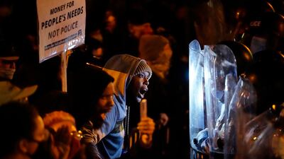 Protesters confront police during a march, Tuesday, Oct. 27, 2020, in Philadelphia.