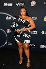 In this image released on October 14, Lizzo poses backstage at the 2020 Billboard Music Awards, broadcast on October 14, 2020, at the Dolby Theatre in Los Angeles, Calif.
