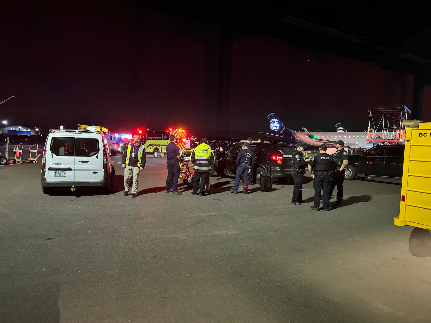 Passengers on the ground at the Portland Airport.