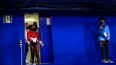 Simone Biles, of the United States, enters the court for the artistic gymnastics women's final at the 2020 Summer Olympics, Tuesday, July 27, 2021, in Tokyo. (AP Photo/Gregory Bull)